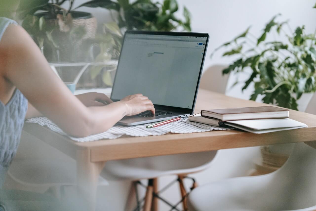 Woman working on a laptop at home Woman using a laptop